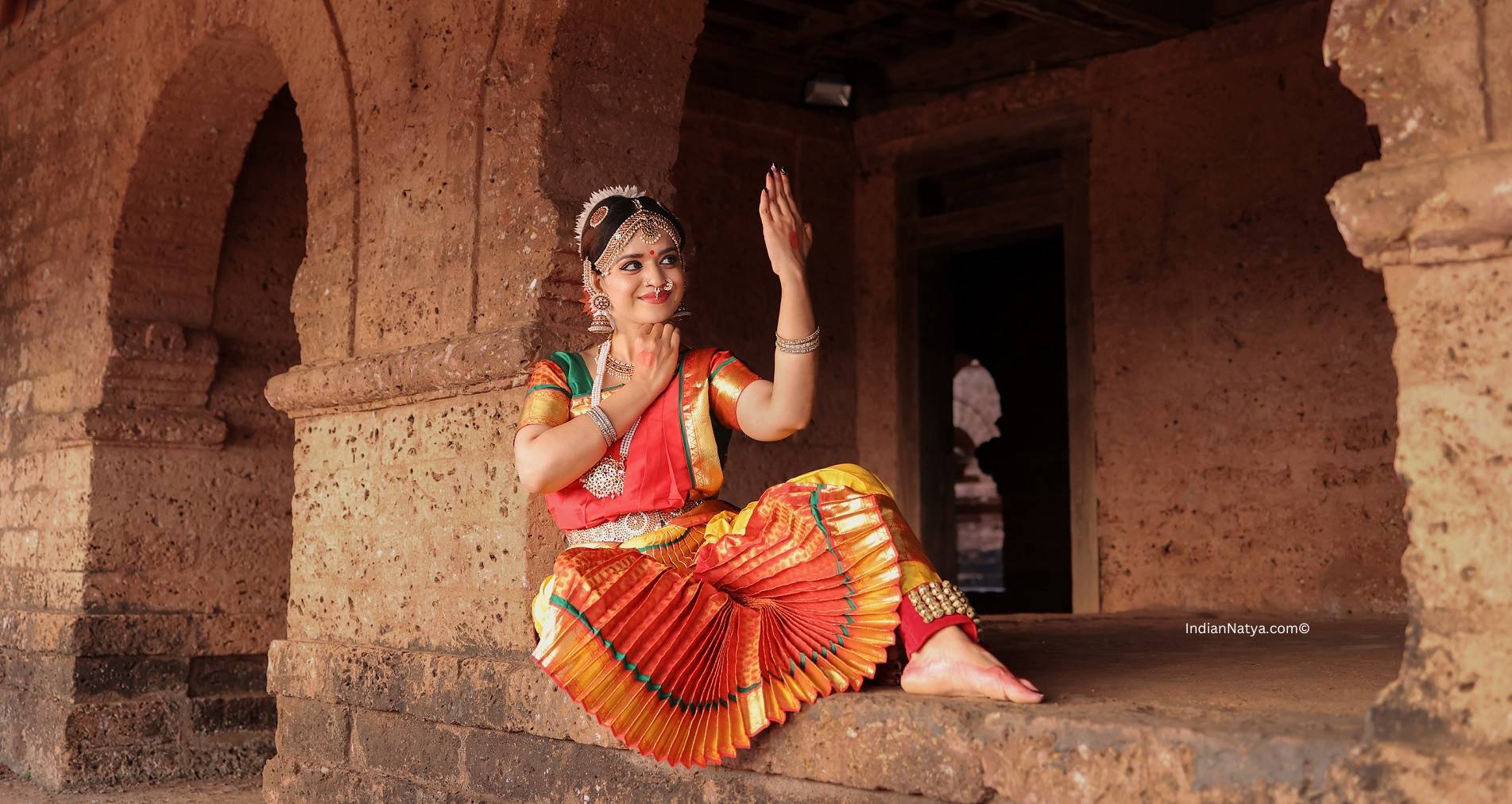 Bharatnatyam Dancer In A Devi Lakshmi Pose During Her Performance On A Dark  Background High-Res Stock Photo - Getty Images